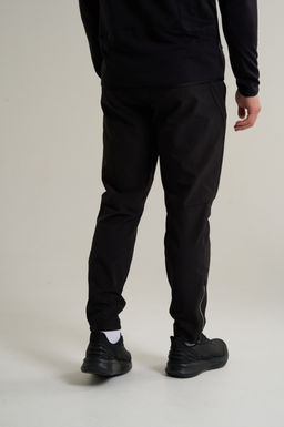 Брюки текстильные утепленные Черный ANTA RUNNING Woven Track Pants фото 5