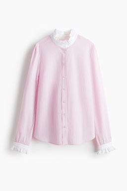 Blusa con cuello de volantes