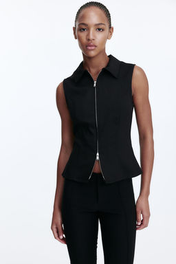 Top sin mangas con cuello camisero y cremallera - H&m фото 3