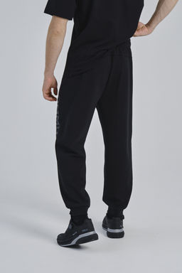 Брюки трикотажные Черный COMMUTE Knit Track Pants - Anta фото 5