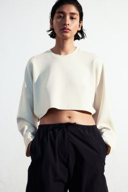 Camiseta de deporte cropped en DryMove - H&m фото 2