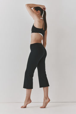 Leggings capri de deporte con SoftMove Flared - H&m фото 5