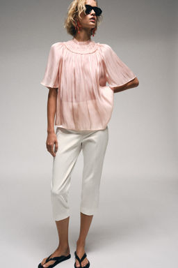 BLUSA EFECTO BRILLO / Rosa pastel