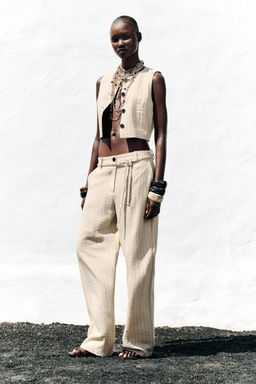 STRIPED TROUSERS WITH BRAIDED BELT