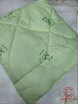 Одеяло стеганное на кровать