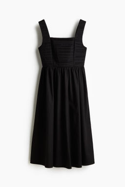 Vestido acampanado con jaretas