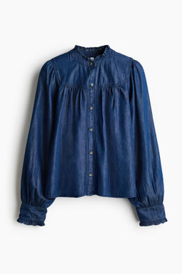 Blusa denim con ribetes de volante