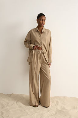 Брюки на кулиске с эффектом меланж