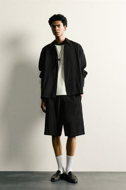 BERMUDA RELAXED FIT RELIEVE / Negro