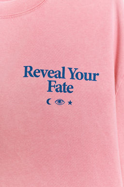 CAMISETA EFECTO LAVADO TEXTO / Rosa