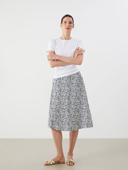 Beli Lastikli ?i?ekli A Kesim Etek