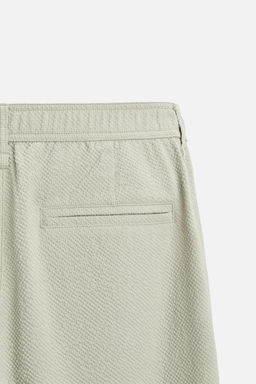 TEXTURED PLEATED TROUSERS - Zara фото 27