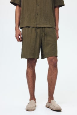 Pantal?n corto texturizado Relaxed Fit - H&m фото 9