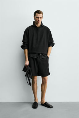 CAMISETA RELAXED FIT ESTRUCTURA / Negro