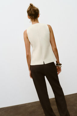 BUTTONED KNIT WAISTCOAT WITH COVERED BUTTONS