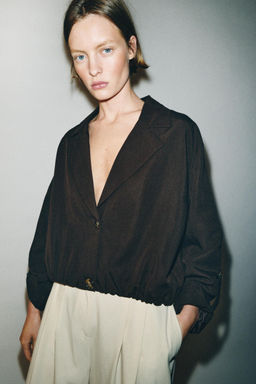 CHAQUETA CORTA BAJO EL?STICO / Marr?n - Zara фото 4