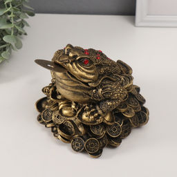 Нэцкэ фигурка «Денежная жаба с монетой на горе монет», полистоун, под бронзу, 16.2×19×16.5 см