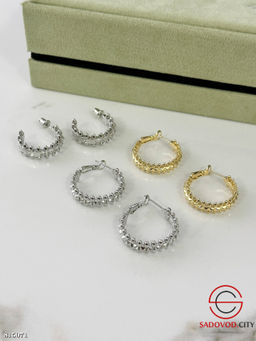 Серьги женские кольца с шипами