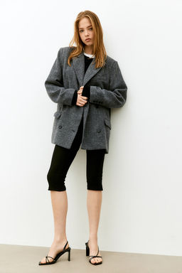 Americana de doble botonadura