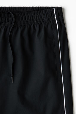 Pantal?n estilo ch?ndal con estampado Relaxed Fit - H&m фото 7