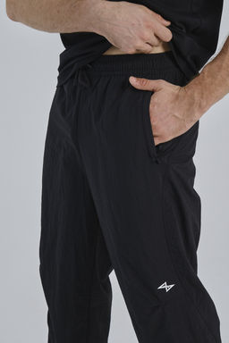 Брюки текстильные Черный SHOCK 4 Woven Casual Pants - Anta фото 3