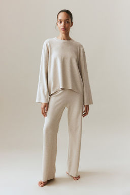 Jersey oversize con bajo redondeado