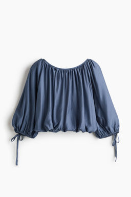 Blusa oversize con lazadas