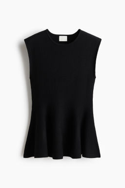 Top de punto con peplum