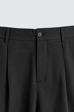PANTAL?N RELAXED FIT PLIEGUES / Negro