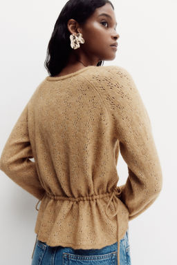 Top en punto pointelle con peplum - H&m фото 2