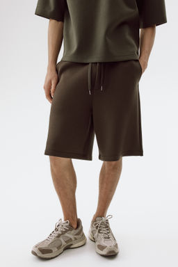 Pantal?n corto efecto neopreno Relaxed Fit - H&m фото 8