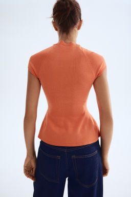 Top en punto fino con peplum - H&m фото 8