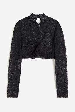 Top cropped de encaje con detalle girado