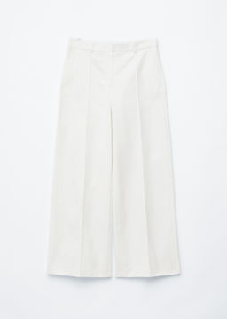 Pantalones de algod?n con pliegues marcados