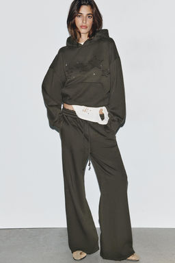 WASHED SWEATSHIRT WITH STARS AND STUDS