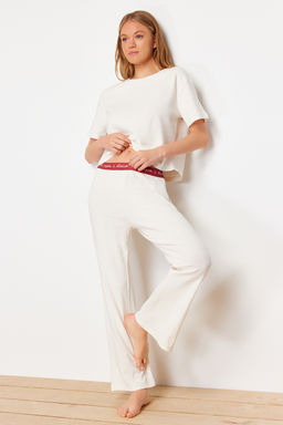 Trendyolmilla Lacivert Slogan Bask?l? Lastik Detayl? Fitilli T-shirt-Pantolon Orme Pijama THMSS21PT1016