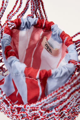 LIMITED EDITION MESH BUCKET BAG