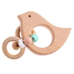 Прорезыватель для зубов Bird с эластичными и деревянными элементами