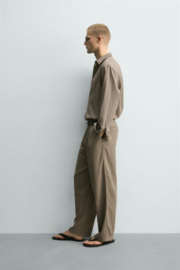 PANTAL?N FLUIDO RELAXED FIT EFECTO ARRUGADO / Beige - Zara фото 4
