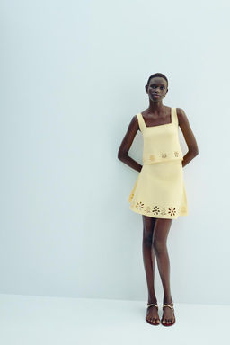 CUTWORK EMBROIDERY KNIT MINI SKIRT