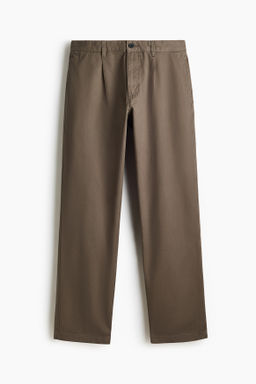 Chinos en sarga de algod?n Relaxed Fit