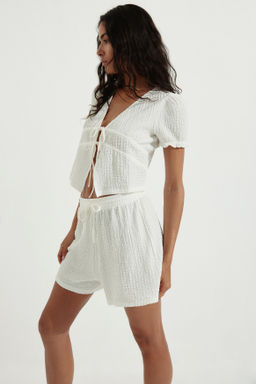 Top arrugado con lazada doble - H&m фото 5