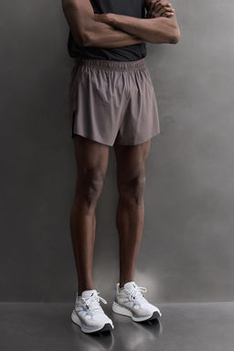 PANTALONES CORTOS LIGEROS RUNNING 3" / Morado