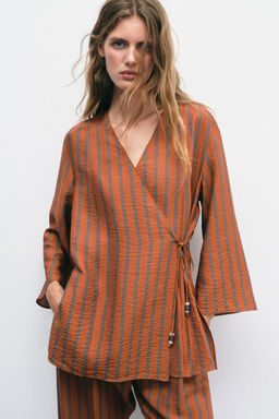 CHAQUETA CRUZADA RAYAS / Naranja quemado