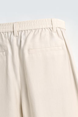 PANTAL?N FLUIDO PLIEGUES LATERALES / Crudo medio - Zara фото 9