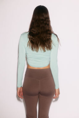 Top de yoga de manga larga con dise?o cropped - H&m фото 10