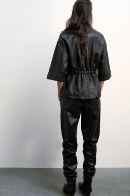 FAUX LEATHER TROUSERS
