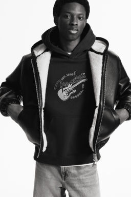 Sudadera estampada con capucha Loose Fit - H&m фото 11
