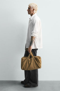 LIMITED EDITION LEATHER TRAVEL BAG