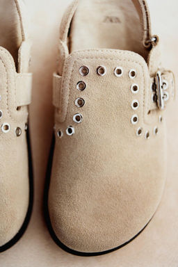 STUDDED SPLIT SUEDE CLOGS